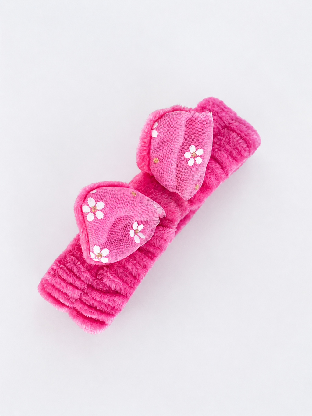 Faixa de Maquiagem Plush Rosa com Laço Floral Charmoso