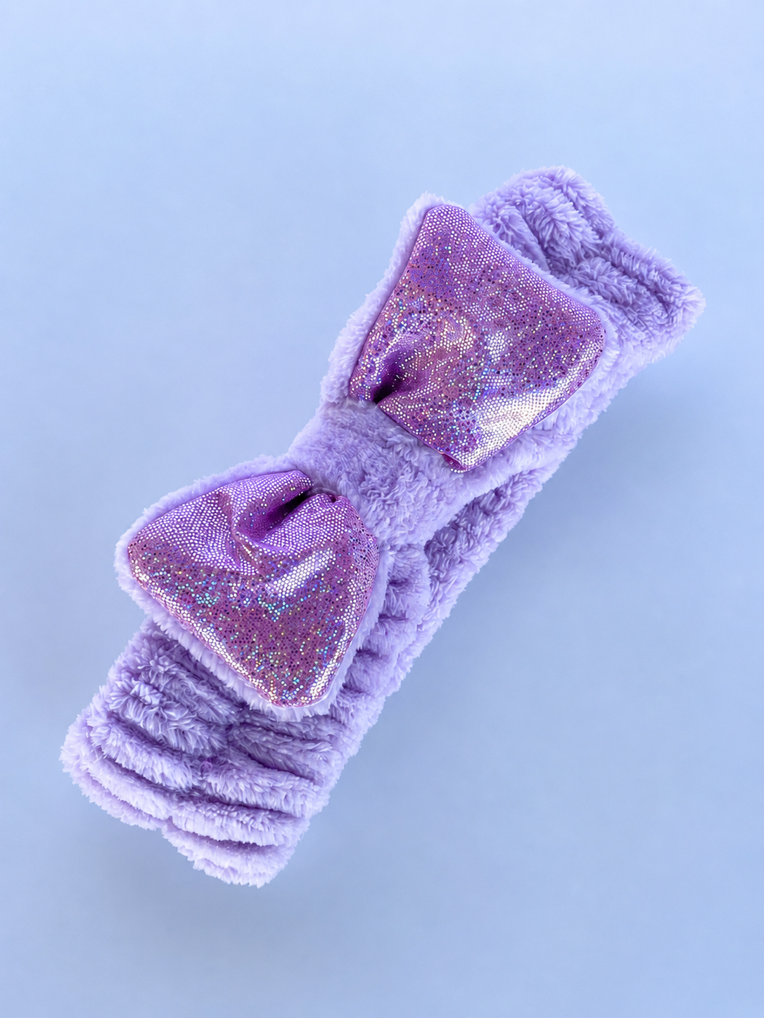Faixa de Maquiagem Plush Lilás com Laço Brilhante